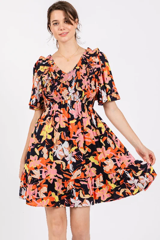 Overstock trendy mini dressNavy Floral Smocked Ruffle Hem Dress